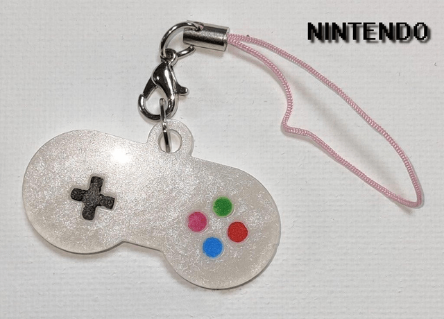 Charm manette